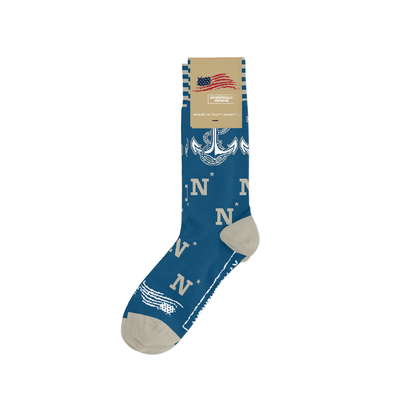 A pair of socks with the USNA anchor logo, predominantly blue with white and gold accents, 'Made in USA'.